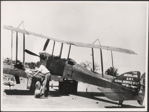 Hudson Fysh cleaning up the BE2E , Thargomindah, Queensland, 1921 [picture]
