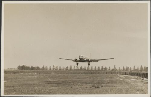 Douglas DC-3, Kyilla, VH-UZJ, approaching runway at an aerodrome [picture]