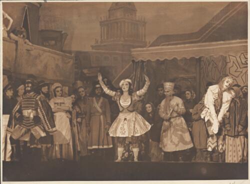 Alberto Alonso as The Blackamoor, Tamara Toumanova as The Dancer, Marian Ladre as The Old Charlatan, Yura Lazovsky as Petrouchka, and artists of the company, in Petrouchka, Original Ballet Russe, Australian tour, His Majesty's Theatre, Melbourne, May 1940 (1) [picture] / Hugh P. Hall