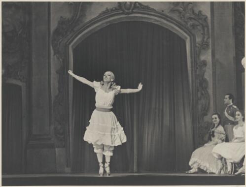 Tatiana Riabouchinska as a junior girl (centre) and artists of the company, in Graduation ball, The Original Ballet Russe, Australian tour, His Majesty's Theatre, Melbourne, 1940 (1) [picture] / Hugh P. Hall