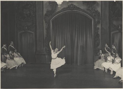 Tatiana Riabouchinska as a junior girl (centre) and artists of the company, in Graduation ball, The Original Ballet Russe, Australian tour, His Majesty's Theatre, Melbourne, 1940 (2) [picture] / Hugh P. Hall