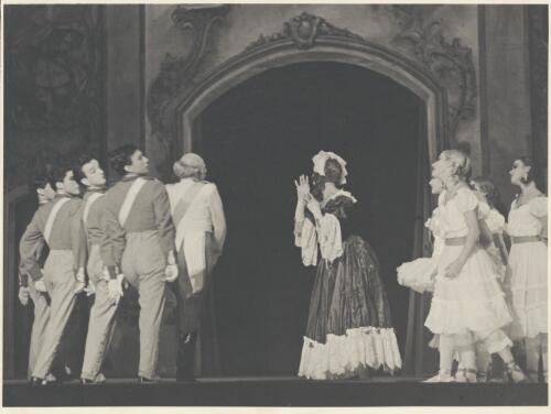 David Lichine as a junior cadet (fourth from left), Igor Schwezoff as the Old General (fifth from left), Borislav Runanine as the Head Mistress (centre), Tatiana Riabouchinska as a junior girl (third from right), and artists of the company, in Graduation ball, The Original Ballet Russe, Australian tour, His Majesty's Theatre, Melbourne, 1940 [picture] / Hugh P. Hall