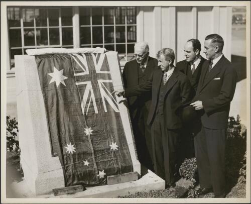 Dr Porter of Oakland,  Mr Kingsford Smith, an unidentified man and Mr O.D.A. Oberg of Sydney, Australia, at the unveiling of a plaque commemorating the flights of Sir Charles Kingsford Smith and Captain Charles Ulm, Oakland, California, 1936 [picture]