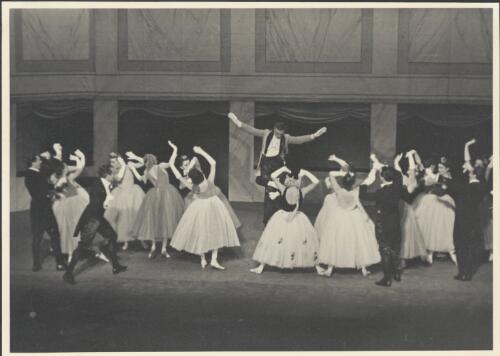 Yurek Shabelevsky as the Conductor (centre elevated), Tatiana Riabouchinska as the Conductress (centre with musical notes on skirt), and artists of the company, in Cotillon, Covent Garden Russian Ballet, Australian tour, His Majesty's Theatre, Melbourne, October 1938 [picture] / Hugh P. Hall
