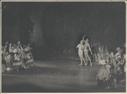 Tatiana Riabouchinska as the Serving Maid (centre left), Roman Jasinsky as the Shepherd (centre right), and artists of the company, in Les dieux mendiants, The Original Ballet Russe, Australian tour, His Majesty's Theatre, Melbourne, April 1940 (1) [picture] / Hugh P. Hall