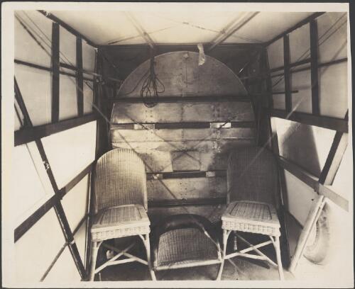 Cabin of Kingsford-Smith's Fokker F.VIIb/3m trimotor monoplane, VH-USU, 'Southern Cross', looking forward towards the cockpit, showing extra fuel tank, Brisbane, Queensland, 1928 [picture] / H.B. Miller