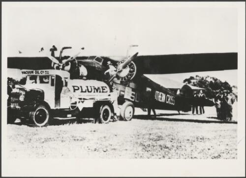 Charles Kingsford-Smith's Fokker F.VIIb/3m, VH-USU, Southern Cross, being refuelled by a Vacuum Oil Company fuel truck, New Zealand, 1934 [picture]