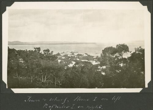 View over the town and the wharf with Horn Island and Prince of Wales Island in the background, Thursday Island, Queensland, ca. 1928 [picture] / Charles Maurice Yonge