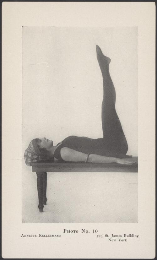Annette Kellermann lying on a table with her feet in the air [picture]