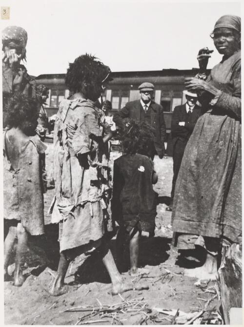 Aboriginal women and children at the Transcontinental railway at Wynbring, South Australia, 1921 [picture]
