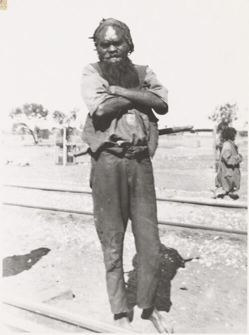 Bearded Aboriginal man standing beside a railway line at Wynbring, South Australia, 1921 [picture]