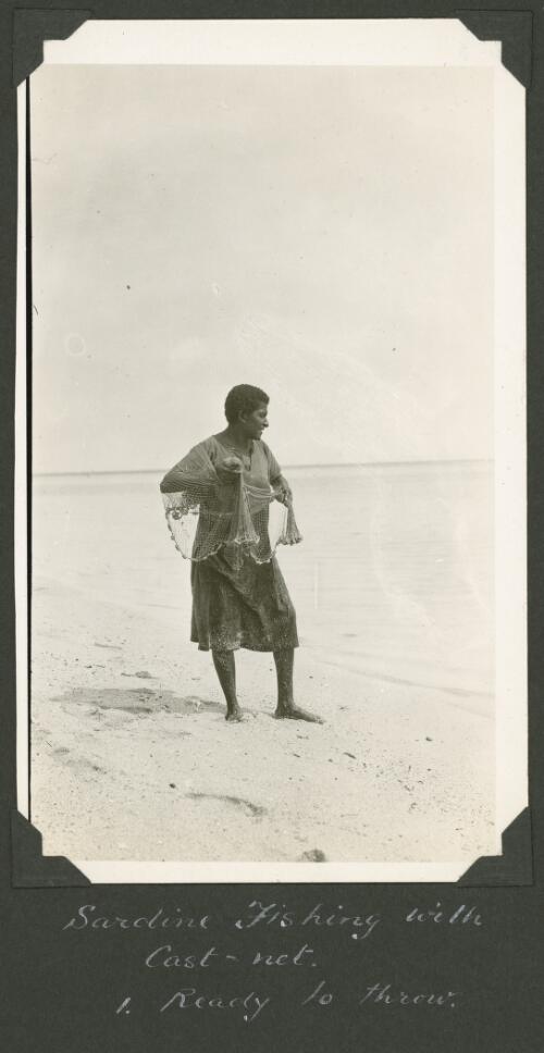 Islander prepares to throw a cast-net for sardines, Meer Island, Queensland, ca. 1928 [picture] / Charles Maurice Yonge