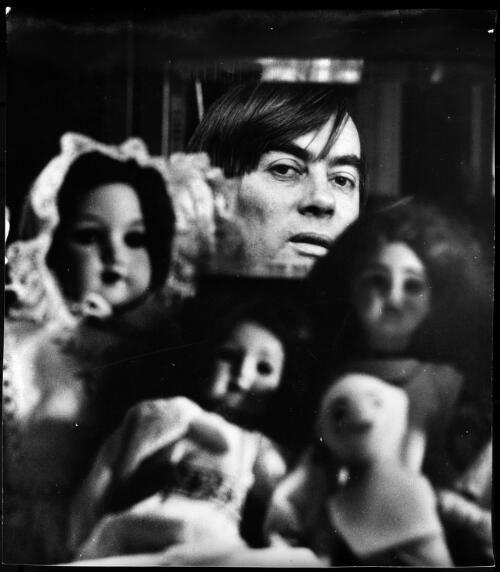 [John Perceval surrounded by the doll collection of his then partner Anne Hall(?), 1973] [picture] / Sue Ford