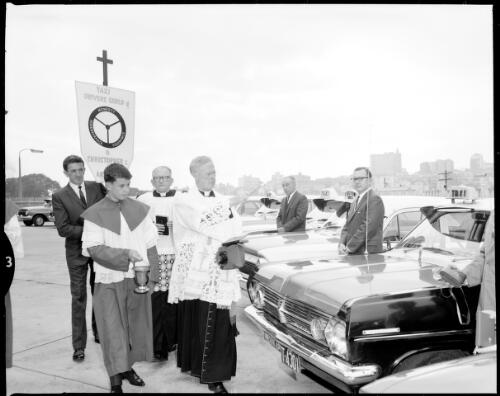 Blessing of the taxi cab in the open air carpark, St. Mary's Cathedral High School, N.S.W., 15 October, 1967 [picture] / John Mulligan