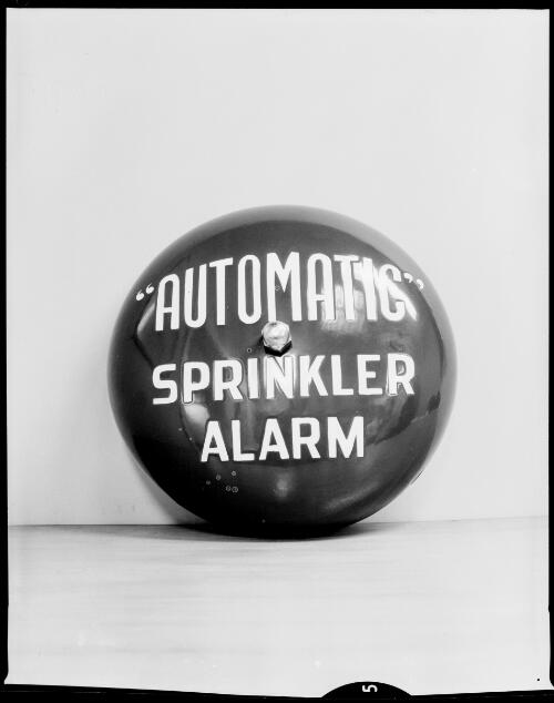 An "automatic" sprinkler alarm at a New South Wales Fire Brigade headquarters, Sydney, 25 June, 1962 [picture] / John Mulligan