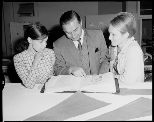 [Three employees looking at a dress design at Dunlop Footwear?, Kingsgrove or Mortdale 17 July 1968] [picture] / John Mulligan