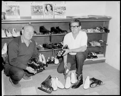 Two unidentified men with sports shoes in the Dunlop Footwear division showroom, Kingsgrove or Mortdale 17 July 1968 [picture] / John Mulligan