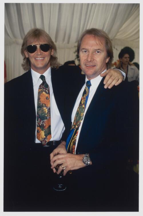 John Farnham and Glenn Wheatley, Melbourne Cup, ca. 1990 [picture] / Rennie Ellis