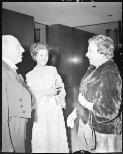 [Sir Paul Hasluck, Governor General of Australia chatting with two women at All Nations Club dinner, Wentworth Hotel, 17 July 1969] [picture] / John Mulligan