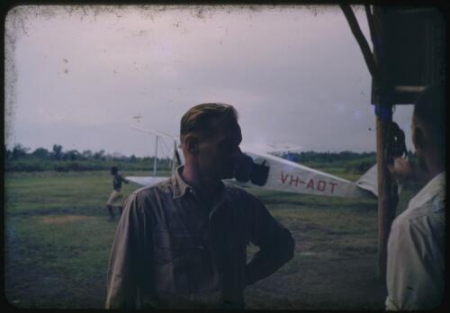 Tony Taylor at the landing strip, Popondetta, Papua New Guinea, 1951 [transparency] / Albert Speer