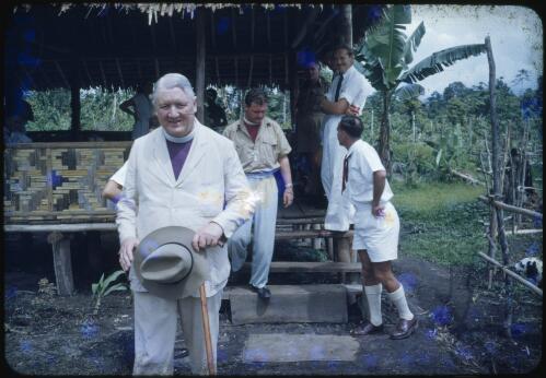 Archbishop Mowll at the mess with Bishop David Hand, District Officer Fred Kaad and Roger Claridge, Saiho, Papua New Guinea, 1951 [transparency] / Albert Speer