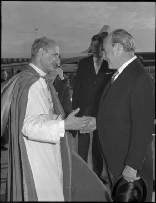 Pope Paul VI meeting the Governor General, Sir Paul Hasluck, on his arrival at Sydney airport, 30 November 1970 [2] [picture] / John Mulligan