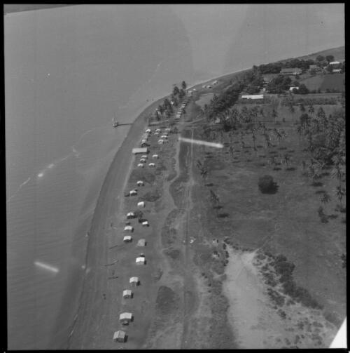 Aerial view of coastline and habitations, Bathurst and Melville Islands, Northern Territory [1] [picture] / John Mulligan