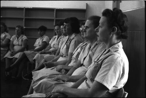 Group of seated prisoners, State Reformatory for Women, Long Bay, Sydney [picture] / John Mulligan