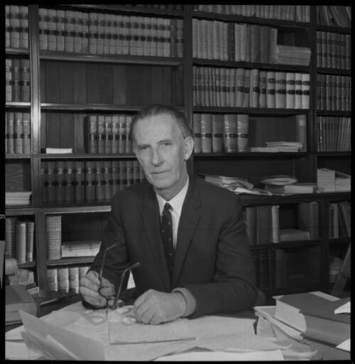 Portrait of Mr Justice Cyril Ambrose Walsh seated in chambers, 20 May 1965 [1] [picture] / John Mulligan
