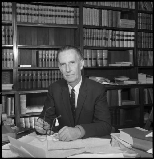 Portrait of Mr Justice Cyril Ambrose Walsh seated in chambers, 20 May 1965 [5] [picture] / John Mulligan