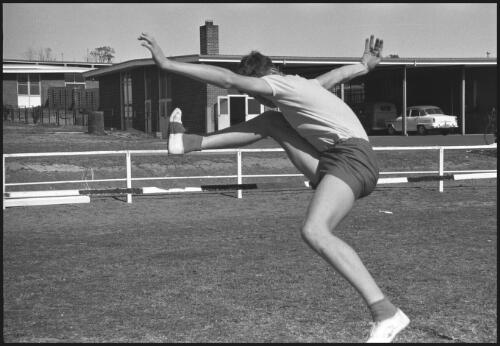 St. Edmund's School for Blind Boys student Phil Scarf competing in the high jump event at the 14th Annual Combined Blind Schools Sports, North Rocks School for Blind Children, Sydney, 14 August 1965 [1] [picture] / John Mulligan