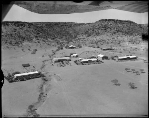 Aerial view of Santa Teresa Mission, Northern Territory, 1 May 1962 [picture] / John Mulligan