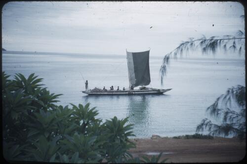 Native canoe being poled along in shallow water, off Ela Beach Port Moresby, Papua New Guinea, 1953 [picture] / Terence and Margaret Spencer