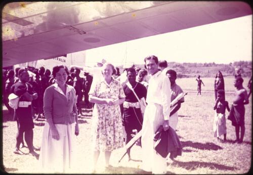 Mrs Kathleen Tomlinson, Mrs Alma Emmanuel, Judge Frank McGrath on airstrip Minj Station, Wahgi Valley, Papua New Guinea, 1954 [picture] / Terence and Margaret Spencer