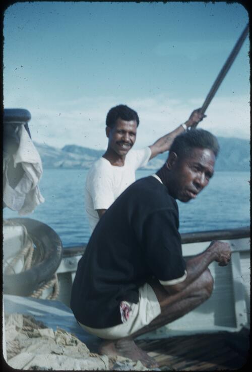 The Papuan Captain Tom, and Lester Bagitia (Pathology Assistant) En route to Mapamoiwa, Fergusson Island, D'Entrecasteaux Islands, Papua New Guinea, 1956-1959 [picture] / Terence and Margaret Spencer