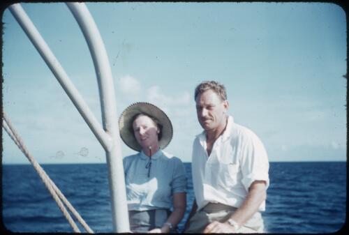 Dr Terry Spencer and Margaret Spencer En route to Mapamoiwa, Fergusson Island, D'Entrecasteaux Islands, Papua New Guinea, 1956-1959 [picture] / Terence and Margaret Spencer