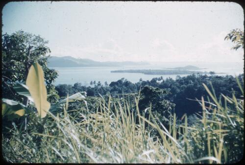 Looking at Sanaroa Island and north along the Fergusson Island coastline Fergusson Island, D'Entrecasteaux Islands, Papua New Guinea, 1956 [picture] / Terence and Margaret Spencer
