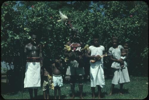 Policeman Maia [Maeya] (the guard for the Malaria Control Service building) and his family ready for singsing (1) Rabaul, New Britain, Papua New Guinea, 1960-1961 [picture] / Terence and Margaret Spencer