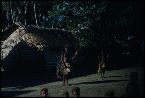 Arawe Island, in front of a house New Britain coastline, Papua New Guinea, 1960 [picture] / Terence and Margaret Spencer