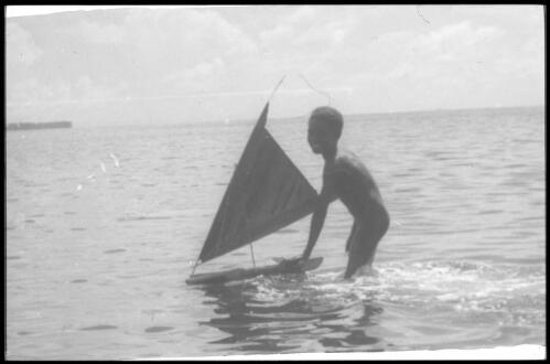 A boy learns to control a canoe, close-up view Carteret Islands, Papua New Guinea, 1960 [picture] / Terence and Margaret Spencer