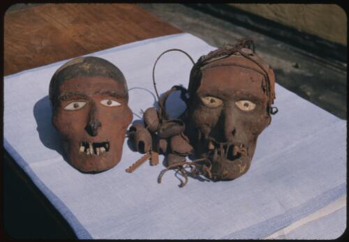 Two painted heads Papua New Guinea [picture] / Terence and Margaret Spencer