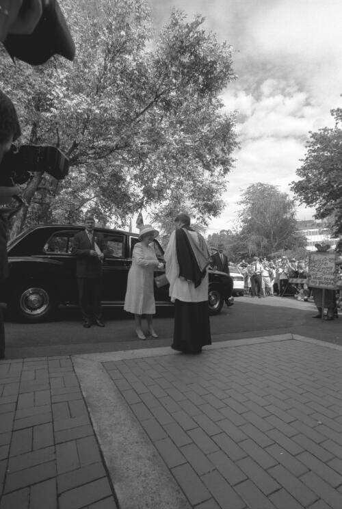 [The Queen is welcomed by the Rev. Jeff Driver, Rector, St Paul's Church, Manuka, A.C.T., 2000] [picture] / Loui Seselja