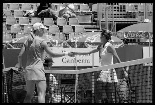 [Elena Dementieva and Selima Sfar on court, Canberra International tennis tournament, 2001] [picture] / Greg Pook