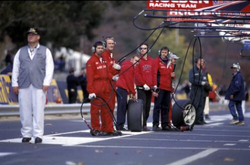 [Holden racing support team in the pits waiting for a tyre change, GMC 400 V8 Supercar Series 2000, Canberra, 9-11 June, 2000] [picture] / Damian McDonald