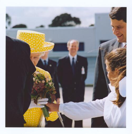 [The Queen is greeted by the Premier Steve Bracks and a young girl as she steps from RAAF plane, Airport, Melbourne, Thursday 23rd March 2000] [picture] / Matthew Sleeth