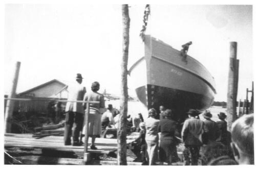 Launching of a boat at Tuncurry shipyard, New South Wales [picture]