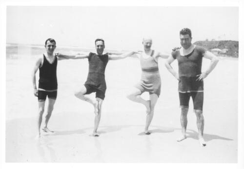 [Portrait of four men, in swimming costumes, on a beach during the visit to Australia of Leopold Amery, British Secretary of State for Dominion Affairs, 1927-1928] [picture]