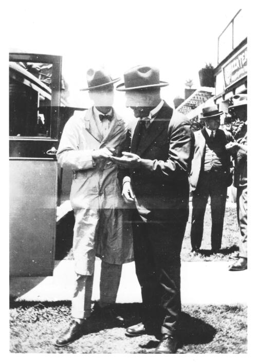 [Portrait of two men beside a bus during the visit to Australia in 1927-1928 of Leopold Amery, British Secretary of State for Dominion Affairs] [picture]