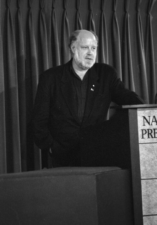 [Portrait of Phillip Adams addressing the National Press Club, Canberra, 27 January 1993] [picture] / Andrew Stawowczyk [Long]