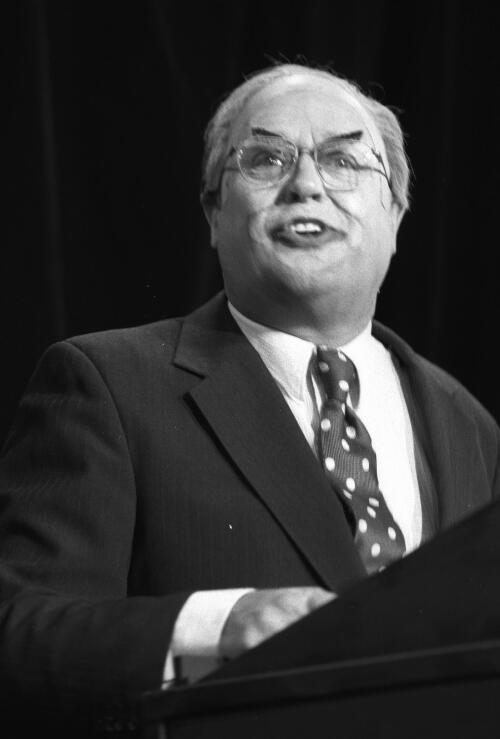 [Portrait of Max Gillies impersonating Prime Minister John Howard at the launch of Kookaburra magazine at the National Press Club, Canberra, 31 October, 1996] [picture] / Andrew S. Long